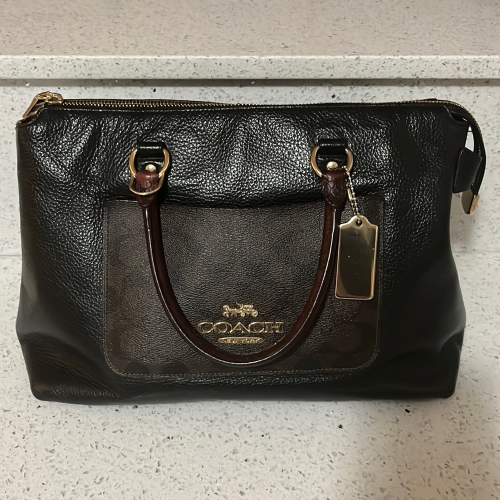 Beautiful Coach brown and black purse.